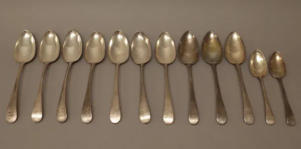 Silver Old English pattern table flatware, comprising; seven table spoons, Newcastle 1799, three table spoons, Newcastle 1800 and two dessert spoons,