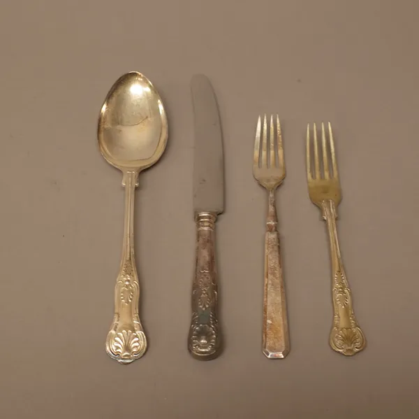 A large quantity of plated table flatware including a part service comprising six tablespoons, two dessert spoons, two table forks, eight table knives