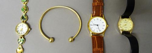 A 9ct gold torque bangle, weight 4 gms, a Sekonda Quartz lady's wristwatch, with a Sekonda box and two further wristwatches, with boxes, (4).