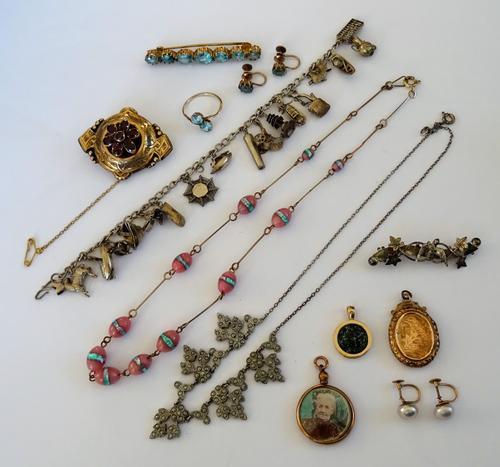 A gold and blue zircon set seven stone bar brooch, a gold and blue zircon set two stone ring, in a crossover design, a pair of blue zircon set single