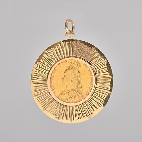 A Victoria Jubilee head sovereign 1890, in a 9ct gold pendant mount, with facet cut decoration.