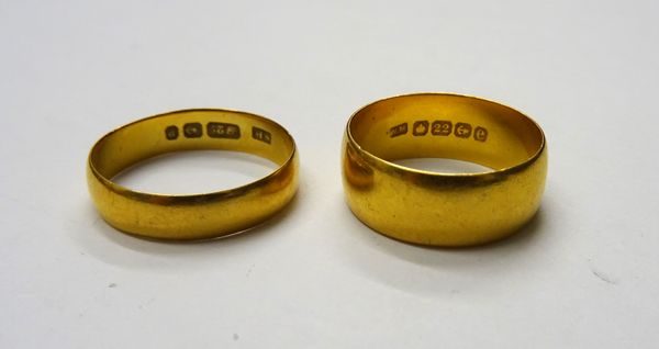 A 22ct gold wide band wedding ring, Birmingham 1904, ring size P and a half and a late Victorian 22ct gold wedding ring, Birmingham 1898, ring size R,