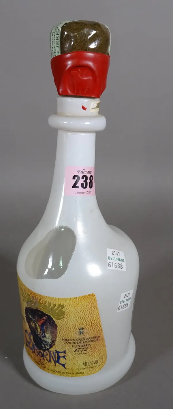A limited edition Osborne brandy bottle designed by Dali.  CAB   2137