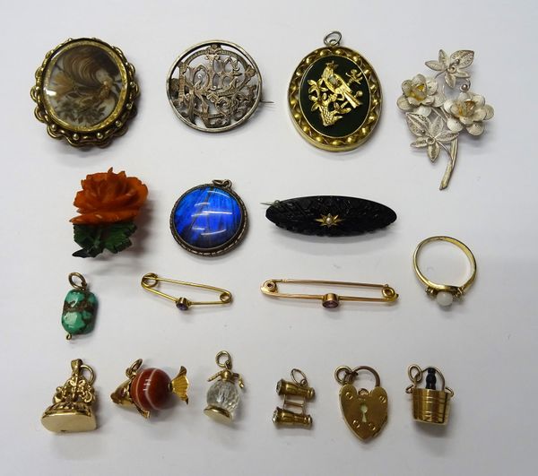 A 9ct gold seal fob charm, five gold mounted mostly charms, seven brooches and pins, three pendants and a ring, (17).