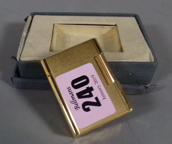 S. T. Dupont; a gold plated lighter.  CAB 1325