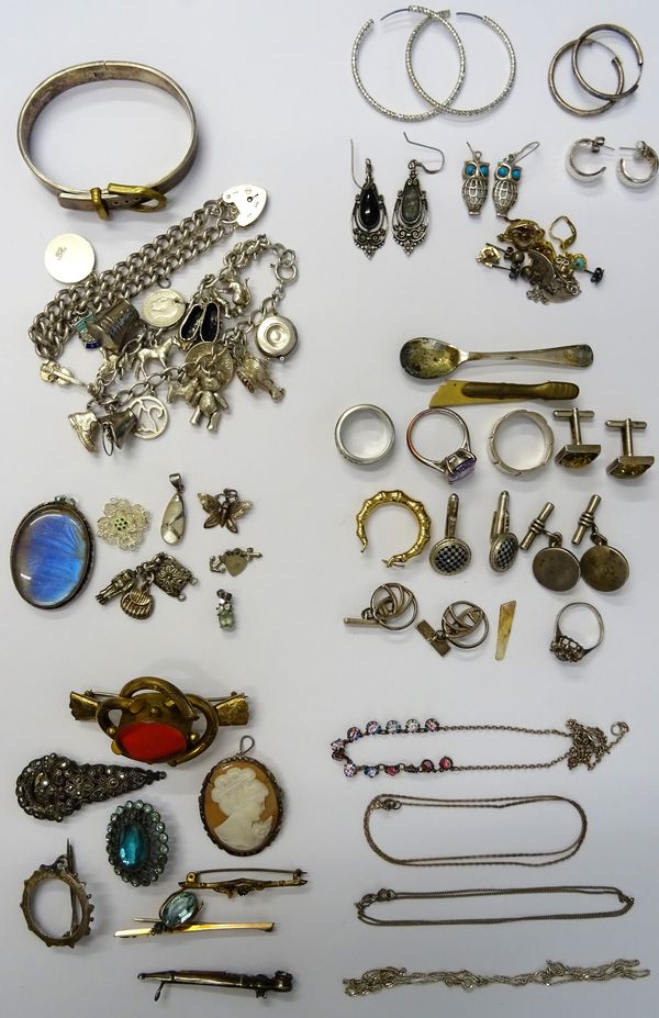 Silver and other jewellery, comprising; two charm bracelets, a bangle, seven brooches, four rings, a marcasite set dress clip, four necklaces and chai