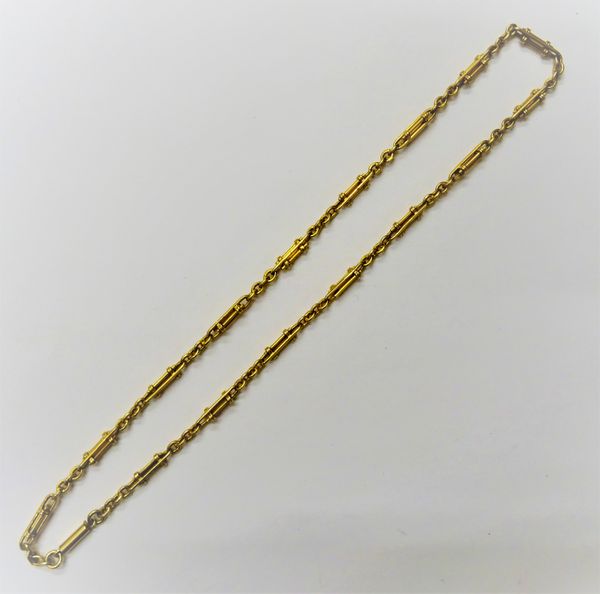 An 18ct gold neckchain, in a decorated twin bar and oval link design, on a cylindrical clasp, detailed 18 CT, length 40cm, weight 16.8 gms.