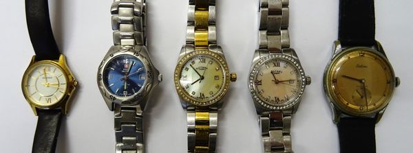 A Rotary gilt metal and steel lady's bracelet wristwatch, a Rotary steel lady's bracelet wristwatch, with spare links, a Rotary International Guarante