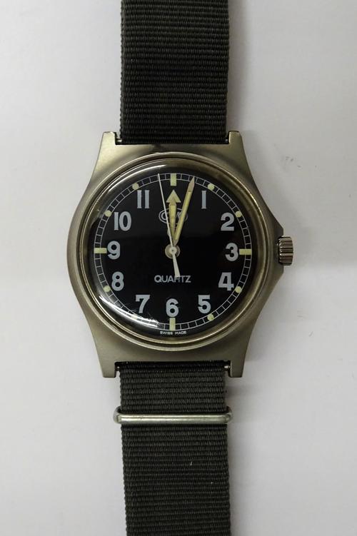 A CWC T Quartz M.O.D issue gentleman's wristwatch, the signed black dial with Arabic numerals and with centre seconds, detailed to the caseback W10/66