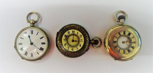 A silver cased, keyless wind, half hunting cased fob watch, with a gilt jewelled lever movement, silver inner case, the enamelled dial with Roman nume