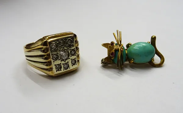 A gold and turquoise set brooch, designed as a cat with red gem set eyes, detailed 750 and a gold and diamond set signet style ring, in a panel shaped