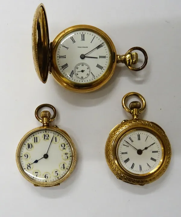 A gold cased, keyless wind, openfaced lady's fob watch, with a gilt cylinder movement, gilt metal inner case, the enamelled dial with black Arabic num