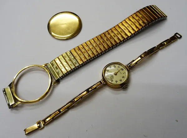 A Lancet 9ct gold, circular cased lady's wristwatch, the signed silvered dial with gilt Arabic numerals and with subsidiary seconds, on a sprung bar l