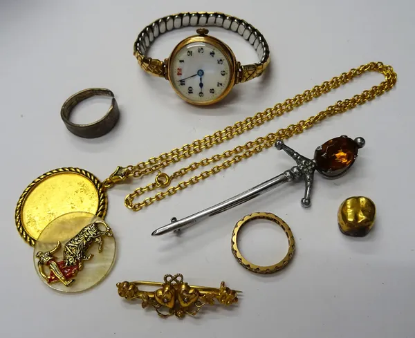 A 9ct gold circular cased lady's wristwatch, on a gilt metal fronted expanding metal bracelet, a gold and seed pearl set bar brooch, with a twin heart