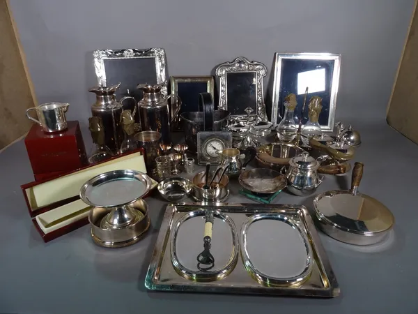 Silver plated wares, including; a pair of Christofle plated jugs, photo frames, cake stands, jugs, bowls and sundry, (qty).  S1B