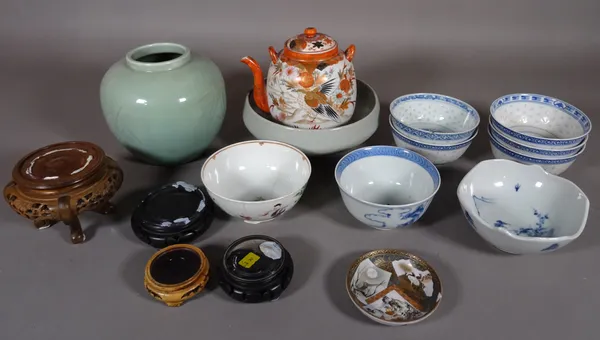A quantity of mostly 20th century Chinese ceramics, including seven blue and white bowls, a Satsuma tea pot, a green glazed ovoid vase and sundry, (qt