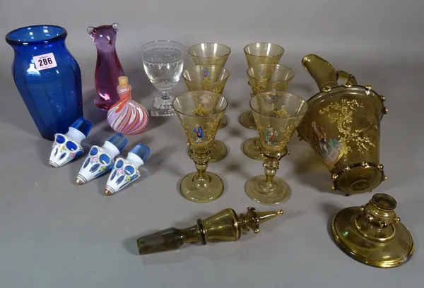 Glassware, comprising; a group of six Continental amber tinted wine glasses and goblet, a group of three blue glass decanter stoppers and sundry, (qty