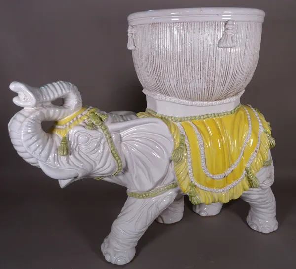 A 20th century ceramic jardiniere formed as an elephant, 75cm wide x 63cm high.   D5