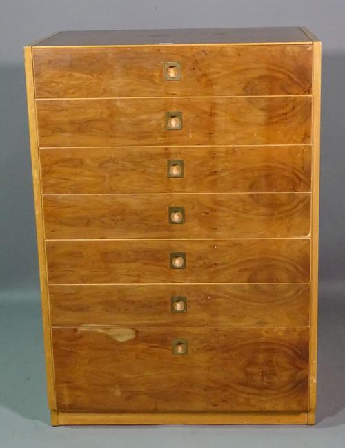 Heals; a 20th century teak and walnut chest of seven long drawers, on plinth base, 70cm wide x 100cm high.  J6