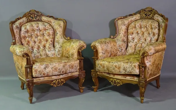 A set of four 20th century hardwood framed armchairs with button back gold floral upholstery, on scroll supports, (4).  D5