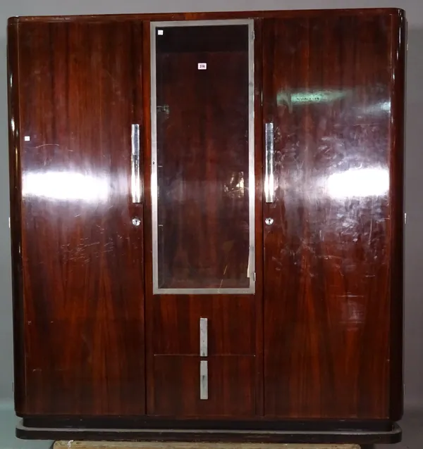 A mid-20th century mahogany side cabinet with central glazed door flanked by solid doors over pair of drawers, 160cm wide x 170cm high.   M7