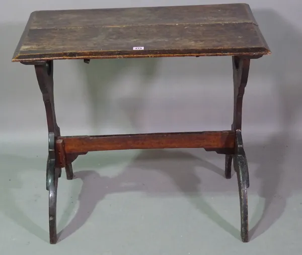 A 19th century and later oak Gothic Revival side table on dual ended downswept supports, 77cm wide x 66cm high, (a.f).  I10