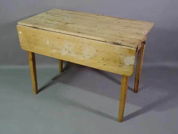 An early 20th century pine drop flap work table with single drawer on tapering square supports, 102cm wide x 72cm high.  BAY 1