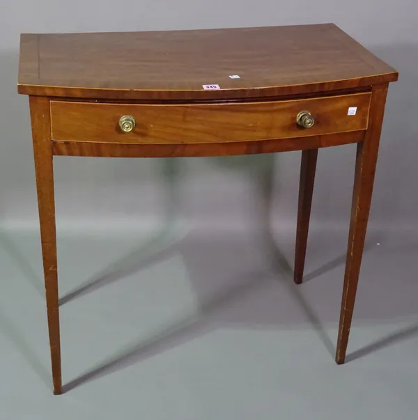 A 19th century mahogany bowfront single drawer side table on tapering supports, 78cm wide x 75cm high.   F7