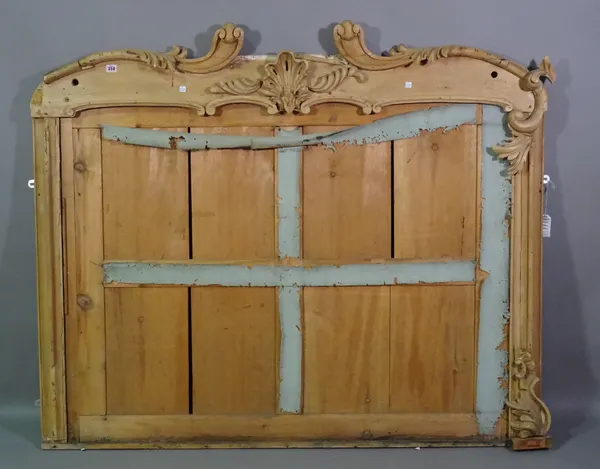 A 19th century pine mirror frame with shell crest and acanthus decoration, 155cm wide x 131cm high, (a.f.).  A4