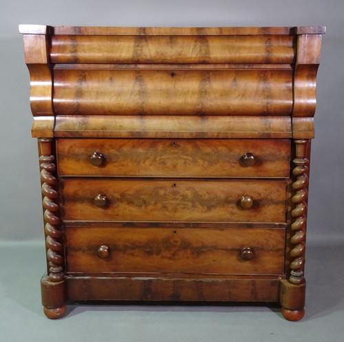 A Victorian walnut chest with two cushioned drawers over three graduated drawers on plinth base, 123cm wide x 120cm high.   F10
