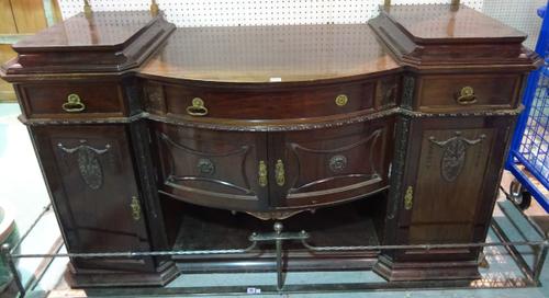 A Victorian style mahogany bowfront sideboard with three drawers over cupboard base, 170cm wide x 137cm high.  ROST