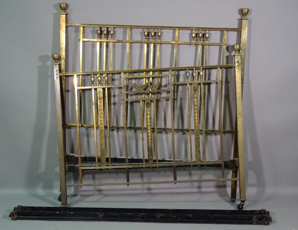 A Regency style brass double bed, 140cm wide x 149cm high.  M10
