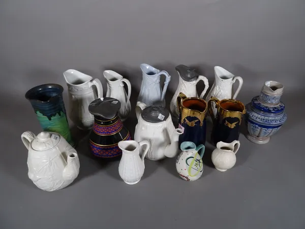 Ceramics; a quantity of Victorian and later ceramic jugs of various designs.  S2T