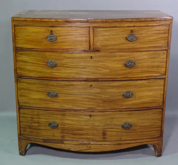 A George III mahogany bowfront chest of two short and three long graduated drawers on bracket feet, 104cm wide x 102cm high.   F7