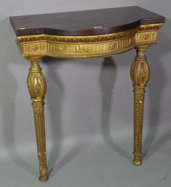 A Regency style gilt wood bowfront console table with later added mahogany top on taping supports, 67cm wide x 81cm high.  D6