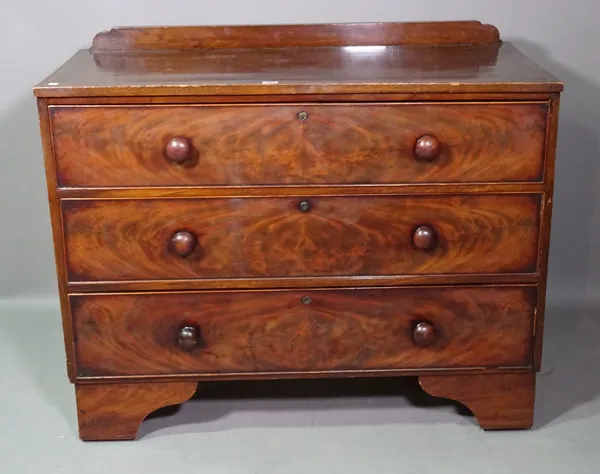 An early 19th century mahogany chest of three long graduated drawers, 108cm wide x 88cm high.   F6