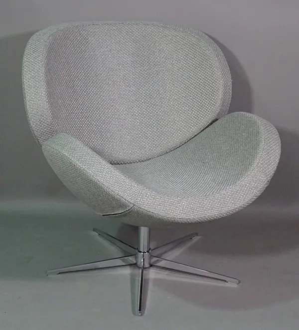 A 20th century grey upholstered Arne Jacobsen replica 'Swan' armchair on chrome base.  BAY 2