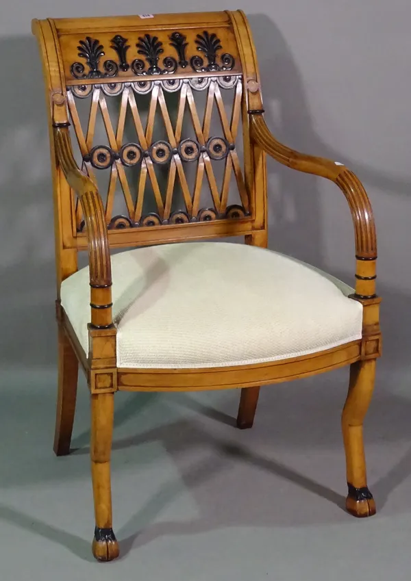 An 18th century style French fruitwood open armchair with lattice back on stylised hoof feet.   G7