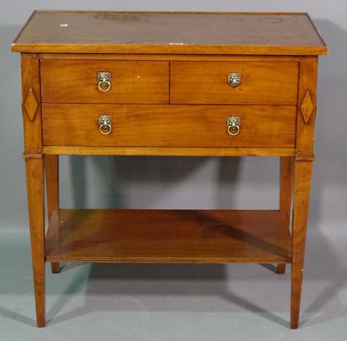 A 20th century French fruitwood side table with two short and one long drawer on tapering supports, 72cm wide x 75cm high.   H5