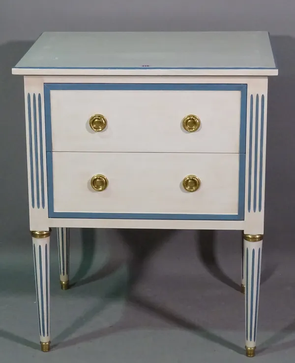 A 20th century blue and white painted two drawer side table on fluted tapering supports, 66cm wide x 80cm high.   C5