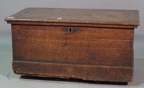 An 18th century oak box, 60cm wide x 35cm high.   E7