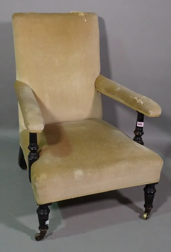 An Edwardian ebonised open armchair.  K8