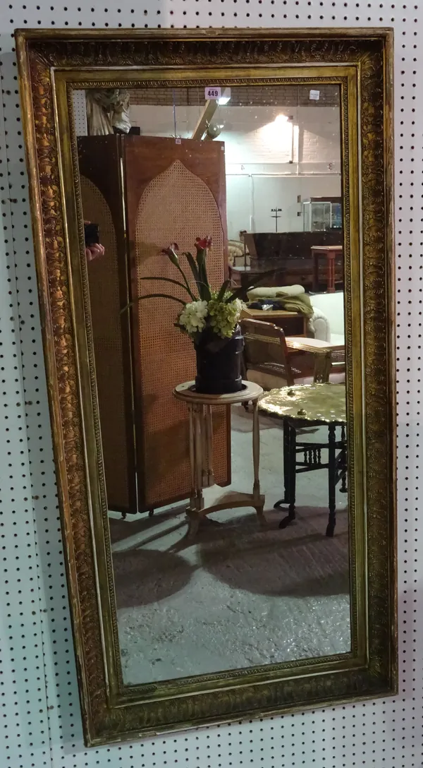 A late 19th century gilt framed rectangular mirror, with acanthus relief moulded decoration, 146cm wide x 72cm high.  H10