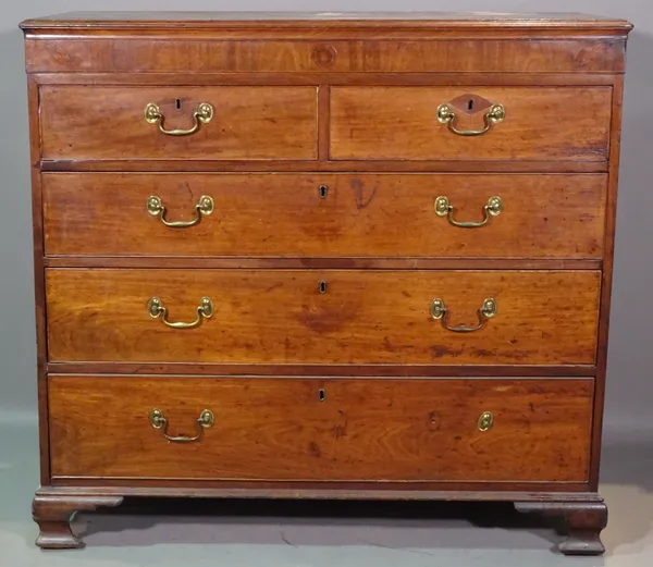 A late George III mahogany chest of two short and three long drawers on ogee bracket feet, 116cm wide x 108cm high.   I7