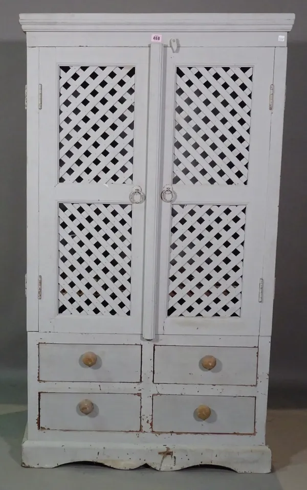 A 20th century grey painted side cabinet with lattice doors over four short drawers, 85cm wide x 150cm high.   H6