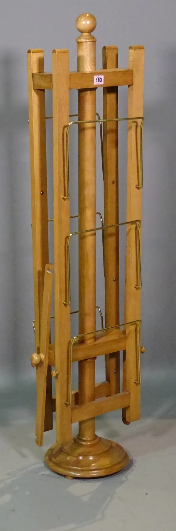 A beech framed floor standing folding clothes rail, 125cm high.    J6