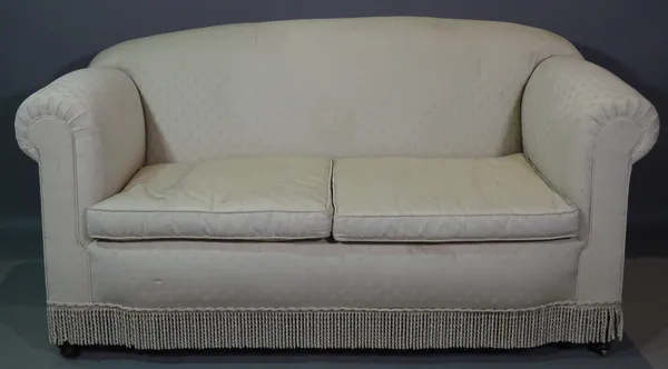 A 20th century mahogany framed two seat sofa, with rollover arms and white upholstery, on tapering supports, 150cm wide.  I6