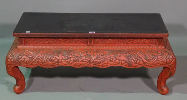 An early 20th century red cinnabar lacquer Chinese low stand, 89cm wide x 40cm high  F7