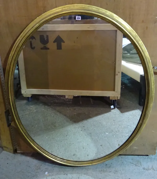 A 19th century gilt framed oval mirror, 110cm wide x 134cm high.  M6