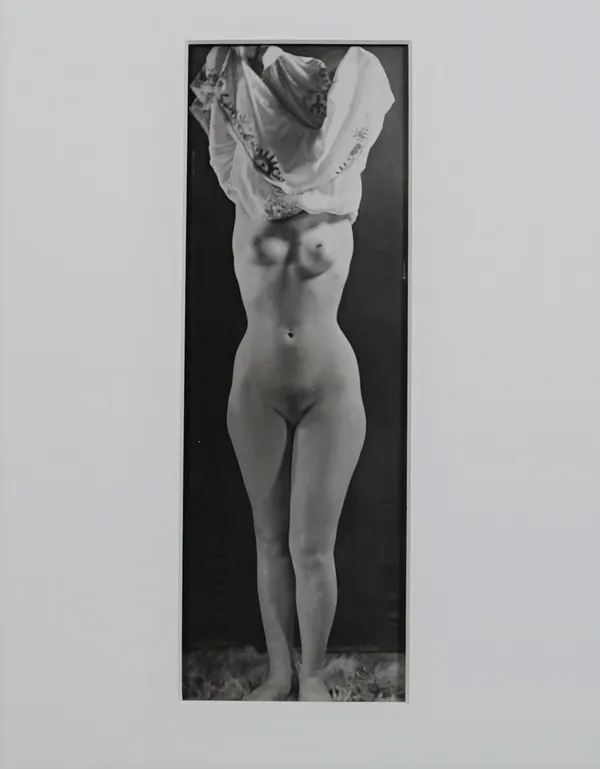 DORA MAAR (1907 - 1997)   Untitled: nude taking off robe, ca. 1930s.  vintage gelatin silver print, mounted, estate sale stamp 'Atelier Dora Maar 1907
